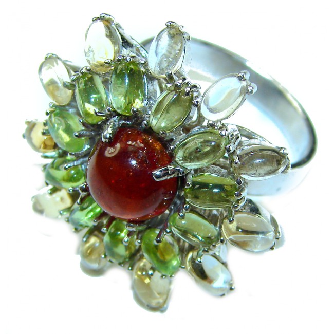Bella Rosa Natural 18.4 carat Ruby .925 Sterling Silver handmade Large Statement Ring size 9 1/4 - Close-up of Bella Rosa 18.4 carat ruby ring with silver and green accents.