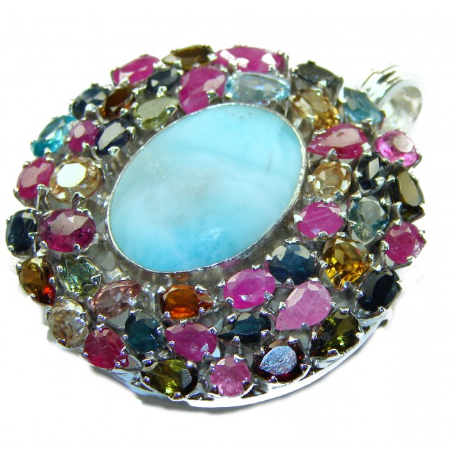 One of a kind Genuine 38.5 carat Larimar Tourmaline .925 Sterling Silver handmade Pendant - Brooch - Close-up of a colorful gemstone pendant with a blue larimar centerpiece.