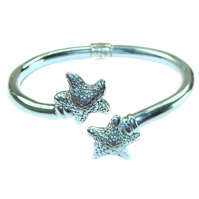 Seaside Italy made Starfish Bracelet in best quality .925 Sterling Silver - Close-up of silver starfish bracelet in focus.