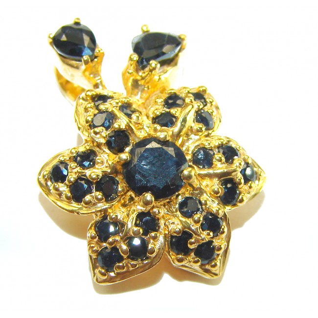 Authentic 10.5 carat faceted Sapphire 14K Gold over .925 Sterling Silver handcrafted Statement Pendant - Close-up of sapphire and gold floral jewelry piece