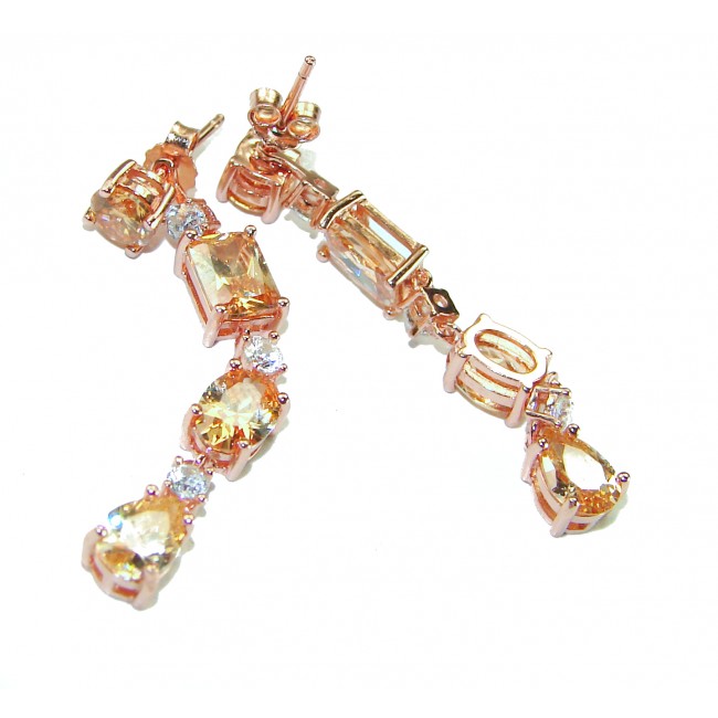 Luxurious Oval cut 7.5 carat Yellow Sapphire 18K Gold over .925 Sterling Silver handcrafted earrings - Close-up of luxurious yellow sapphire earrings in 18K gold.