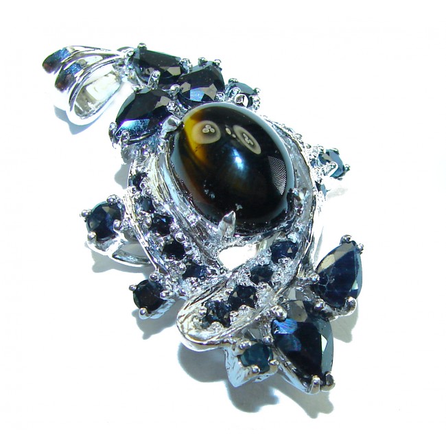 Mademoiselle - Vintage Design 18.4 CARAT Sapphire .925 Sterling Silver handcrafted Pendant - Close-up of vintage silver pendant with sapphire and eye-shaped stone