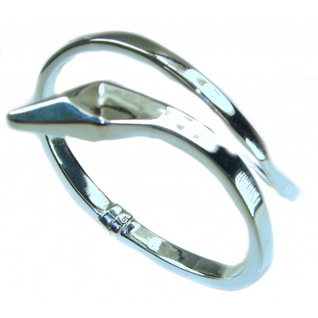Snake - highly polished Italy made Bracelet in best quality .925 Sterling Silver - Side view of a polished snake-shaped bracelet.