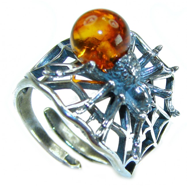 Golden Spider Authentic Baltic Amber .925 Sterling Silver handcrafted ring; s. 7 adjustable - Silver and amber spider ring, top angle, web detail visible.
