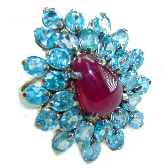 Incredible 29.5 carat Swiss Blue Topaz Ruby .925 Sterling Silver Oversized Ring size 7 3/4 - Close-up of a ring with blue topaz and ruby stones in sterling silver.