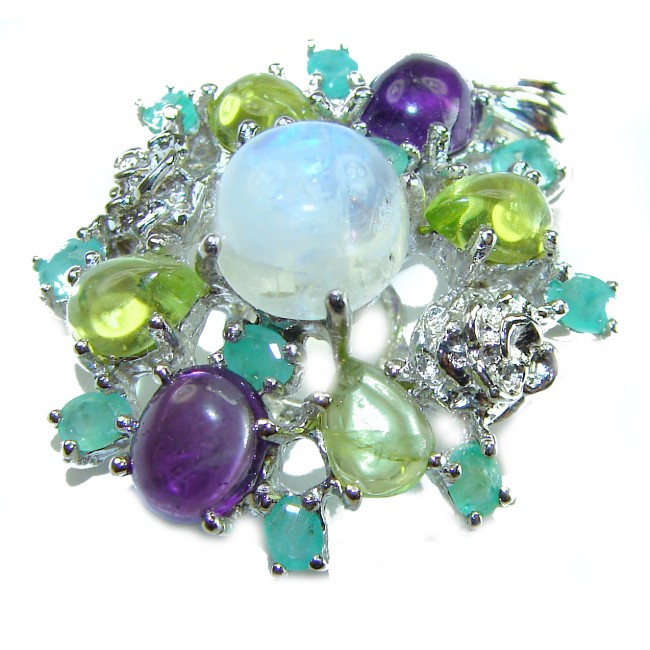 Genuine 6.2 carat Fire Moonstone .925 Sterling Silver handcrafted pendant