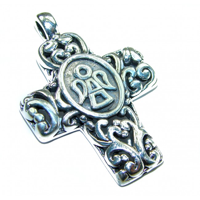 Protective angel - Holy Cross .925 Sterling Silver Pendant - Front view of ornate sterling silver cross pendant with angel design.