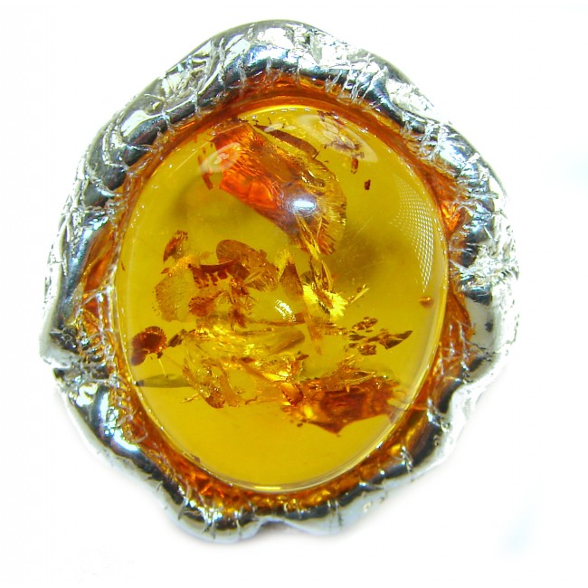 Large Golden Power natural Baltic Amber .925 Sterling Silver handcrafted ring; s. 7 adjustable - Close-up of Baltic Amber gemstone in silver setting.