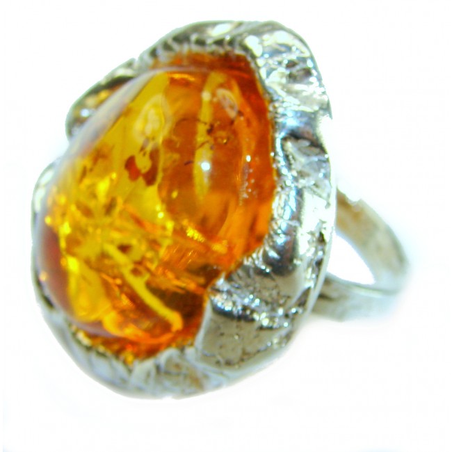 Large Golden Power natural Baltic Amber .925 Sterling Silver handcrafted ring; s. 7 adjustable - Close-up of a large amber ring in .925 sterling silver setting.