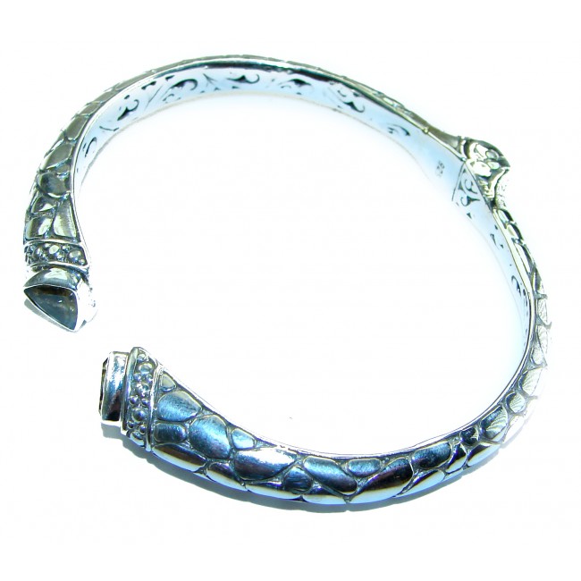 6.5 carat Amethyst .925 Sterling Silver handcrafted Statement Bali made Bracelet - Sterling silver bracelet with amethyst, side view, engraved details.