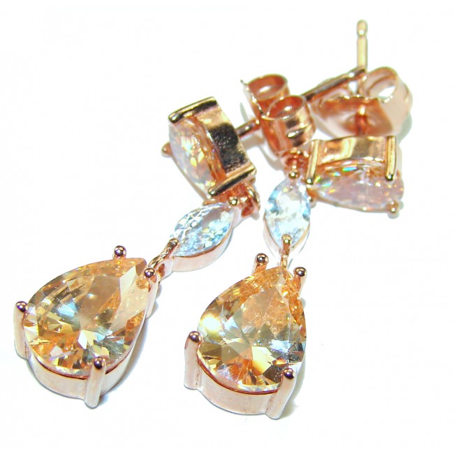 Luxurious Oval cut 7.5 carat Yellow Sapphire 18K Gold over .925 Sterling Silver handcrafted earrings - Close-up of luxurious yellow sapphire earrings in 18K gold.