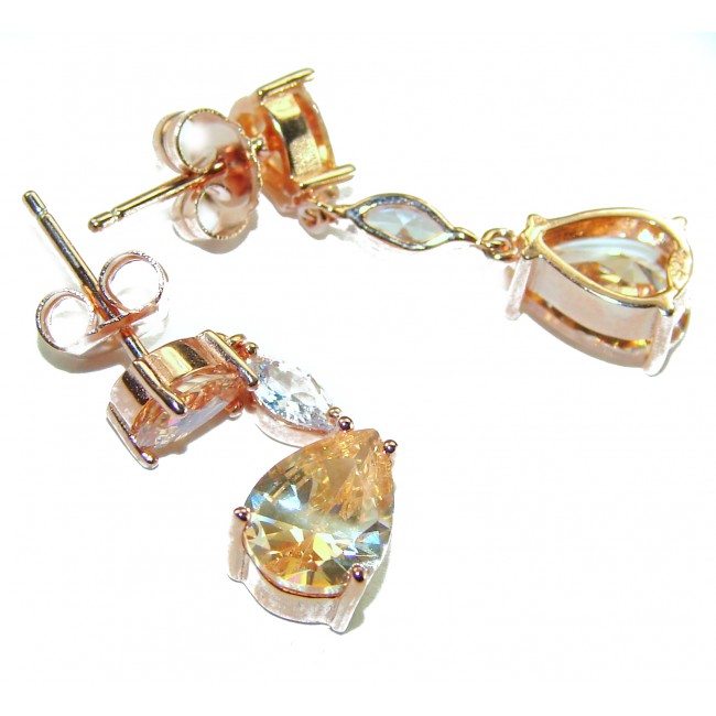 Luxurious Oval cut 7.5 carat Yellow Sapphire 18K Gold over .925 Sterling Silver handcrafted earrings - Close-up of luxurious yellow sapphire earrings in 18K gold setting.