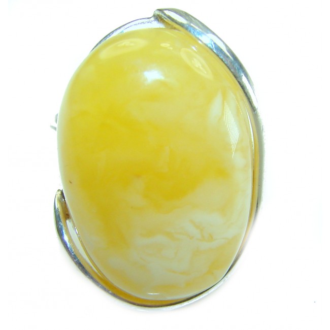 Authentic Golden Butterscotch Baltic Amber .925 Sterling Silver entirely handcrafted ring; s. 7 adjustable - Close-up of butterscotch Baltic amber in .925 sterling silver setting.