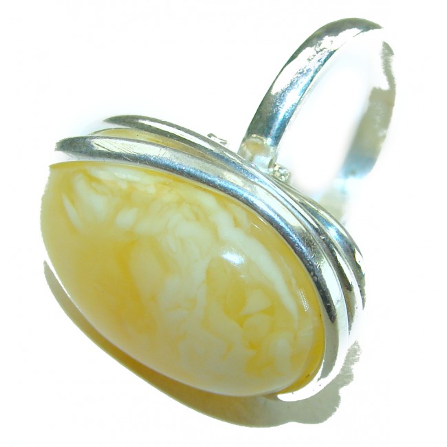 Authentic Golden Butterscotch Baltic Amber .925 Sterling Silver entirely handcrafted ring; s. 7 adjustable - Side view of butterscotch Baltic amber ring in sterling silver setting