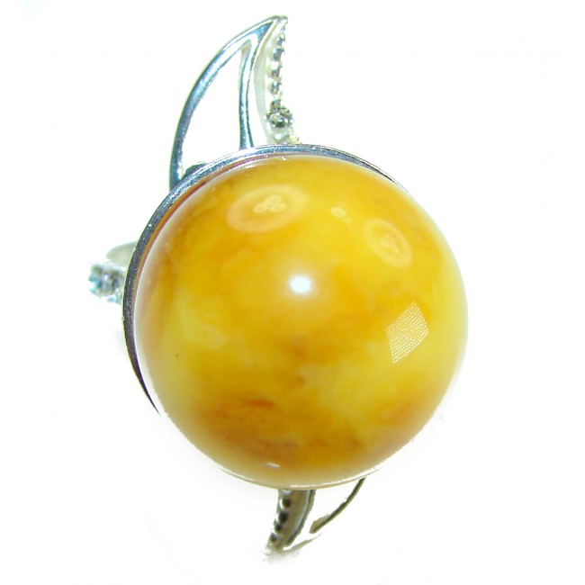 Large Golden Power Butterscotch Baltic Amber .925 Sterling Silver handcrafted ring; s. 8 - Close-up of large butterscotch amber ring with silver setting.