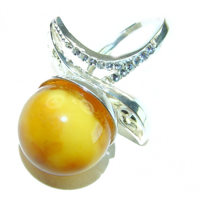 Large Golden Power Butterscotch Baltic Amber .925 Sterling Silver handcrafted ring; s. 8 - Close-up of large butterscotch amber ring with sterling silver setting.