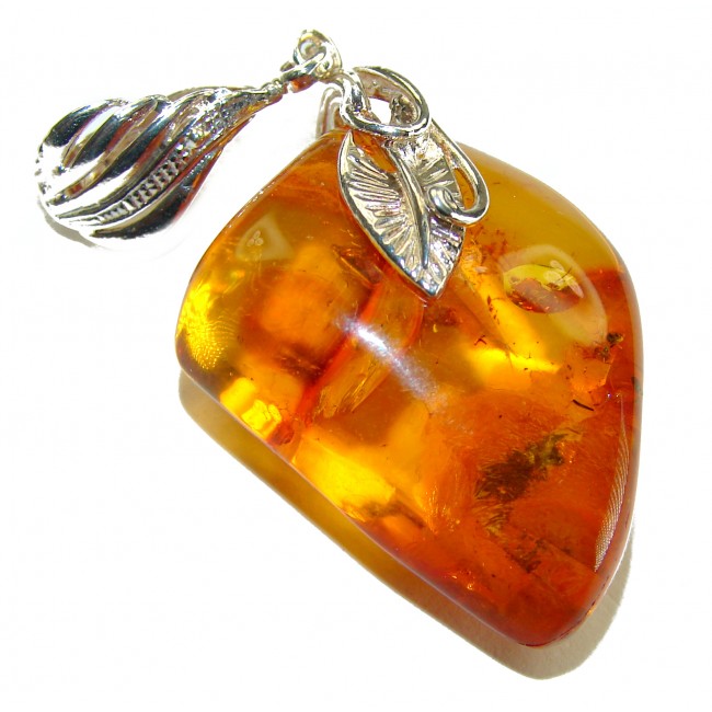 Fabulous Baltic Amber .925 Sterling Silver handmade Pendant - Close-up of Baltic Amber and silver pendant with leaf design.