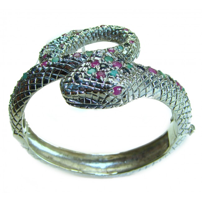 Huge 54.2 carat Precious Snake Genuine Ruby Emerald Sapphire .925 Sterling Silver handcrafted Bracelet - Snake bracelet with ruby, emerald, and sapphire stones, side view.
