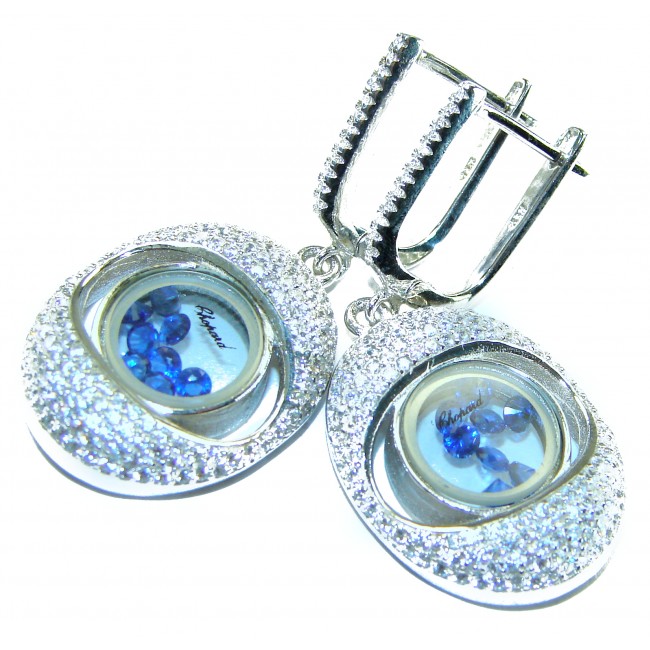 Floating Memories 8.5 carat Sapphire .925 Sterling Silver Handcrafted Statement earrings - Close-up of sapphire earrings with sparkling silver details