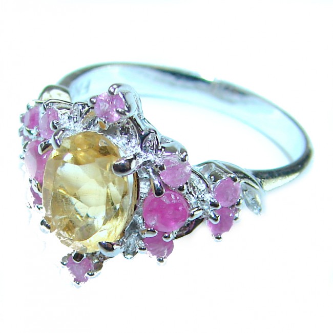 Luxurious 4.5 carat yellow Sapphire .925 Sterling Silver handcrafted ring; s. 6 - Close-up of yellow sapphire ring with pink accents in sterling silver.
