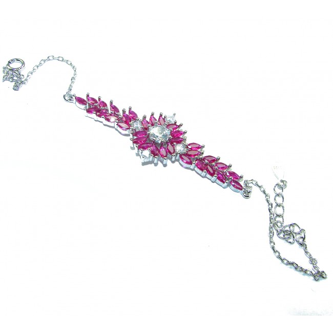 Tiffany - Luxurious natural 26.5 carat Ruby .925 Sterling Silver Statement Bracelet - Bracelet top view with pink rubies and central clear stone.