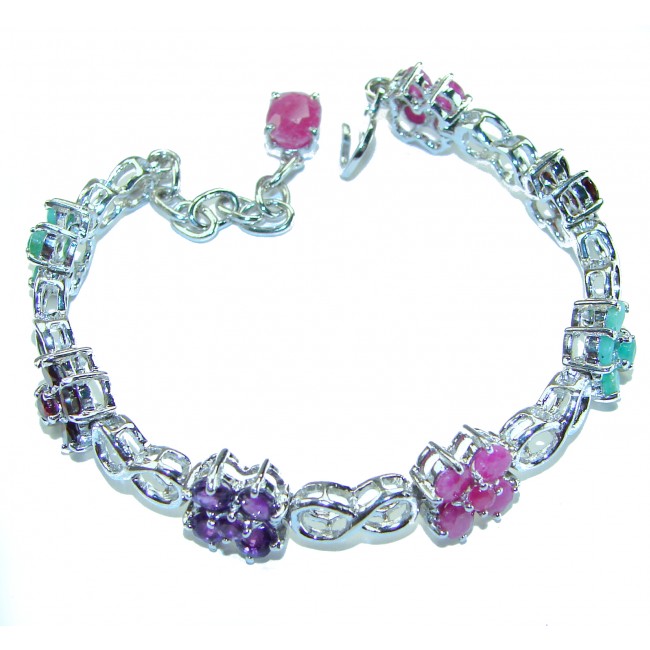 Gabriella 25.5 carat Genuine Ruby Emerald Sapphire .925 Sterling Silver handcrafted Bracelet - Bracelet with gemstones and infinity links, top view.