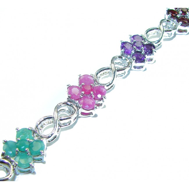 Gabriella 25.5 carat Genuine Ruby Emerald Sapphire .925 Sterling Silver handcrafted Bracelet - Close-up of multi-gemstone floral bracelet with infinity links