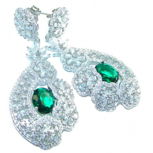 Special design! Opera - Precious - 11.8 carat Emerald .925 Sterling Silver handcrafted Statement earrings - Close-up of intricate earrings with emerald and floral designs.