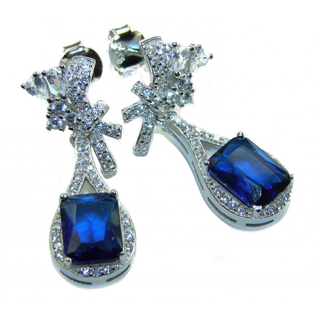 Pear cut 4.5 carat Sapphire .925 Sterling Silver handcrafted incredible earrings - Close-up of sapphire and diamond sterling silver earrings.