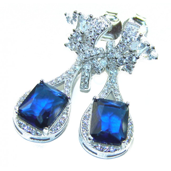 Pear cut 4.5 carat Sapphire .925 Sterling Silver handcrafted incredible earrings - Close-up of sapphire earrings in sterling silver, showcasing details and stones.