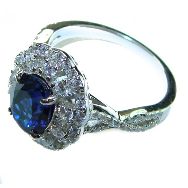 Luxurious 4.8 carat Sapphire .925 Sterling Silver handcrafted Ring size 8 - Side view of sapphire ring with sterling silver and diamond accents