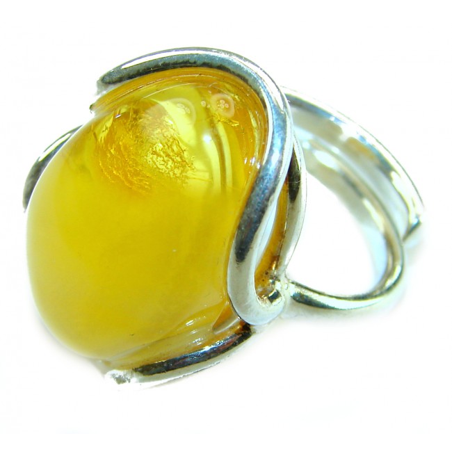 Authentic Golden Butterscotch Baltic Amber .925 Sterling Silver entirely handcrafted ring; s. 7 adjustable - Close-up of golden butterscotch Baltic amber ring in sterling silver.