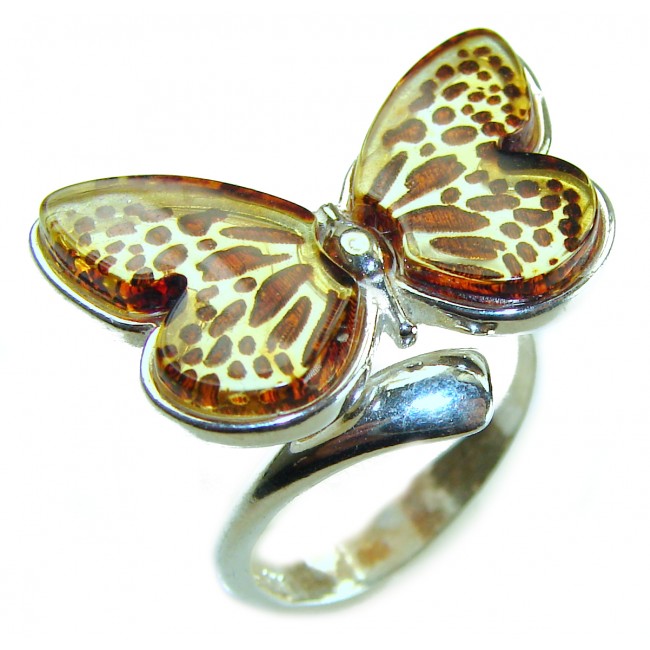 Butterfly Authentic carved Baltic Amber .925 Sterling Silver handcrafted ring; s. 8 adjustable - Butterfly amber ring in silver, top view, intricate wing detail.