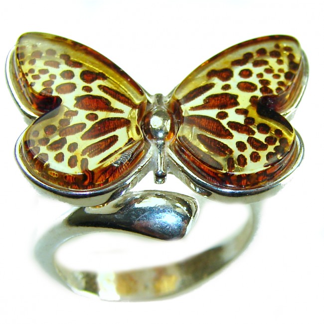 Butterfly Authentic carved Baltic Amber .925 Sterling Silver handcrafted ring; s. 8 adjustable - Butterfly amber ring in sterling silver, top view close-up.