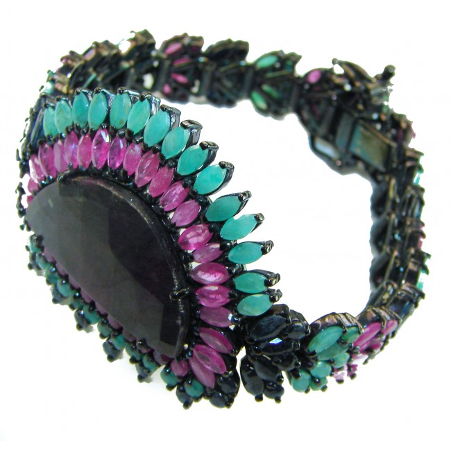 Gabriella 82.2 carat authentic Ruby black rhodium over .925 Sterling Silver handcrafted Statement Bracelet - Side view of Gabriella 82.2 carat Ruby bracelet with black rhodium.