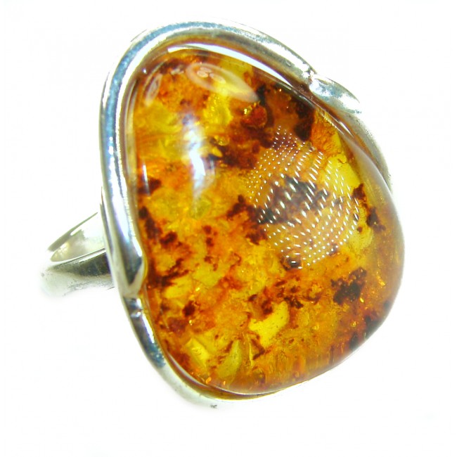 Huge Beauty of the Nature Cognac Baltic Amber .925 Sterling Silver handcrafted ring; s. 7 adjustable - Close-up of cognac Baltic amber ring with sterling silver setting.