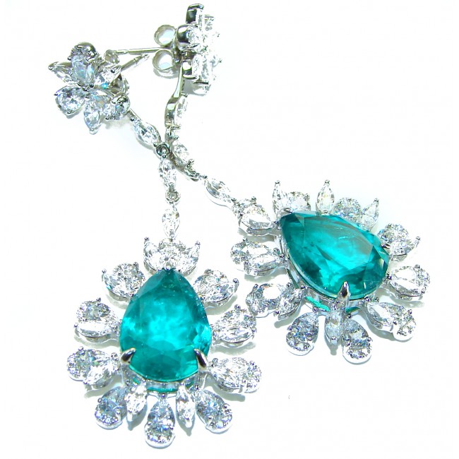 Vintage style - Timless Beauty 12.5 carat Emerald .925 Sterling Silver handcrafted Statement earrings - Close-up of vintage style emerald and diamond earrings in silver.