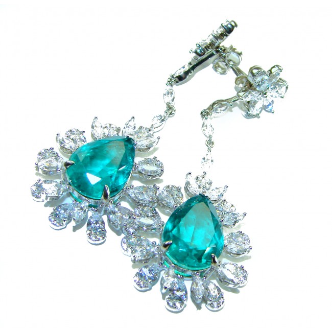 Vintage style - Timless Beauty 12.5 carat Emerald .925 Sterling Silver handcrafted Statement earrings - Close-up of emerald earrings with diamond accents, vintage style.