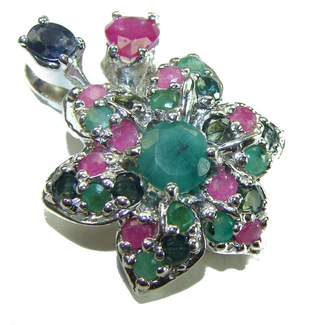 Authentic 10.5 carat Ruby Emerald Sapphire .925 Sterling Silver handcrafted Pendant - Floral gemstone pendant close-up, showcasing ruby, emerald, and sapphire stones.