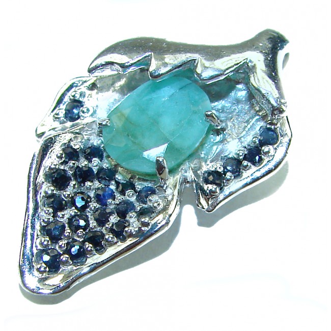 Authentic 4.5 carat Emerald Sapphire .925 Sterling Silver handcrafted Pendant - Emerald Sapphire sterling silver brooch, top view close-up.