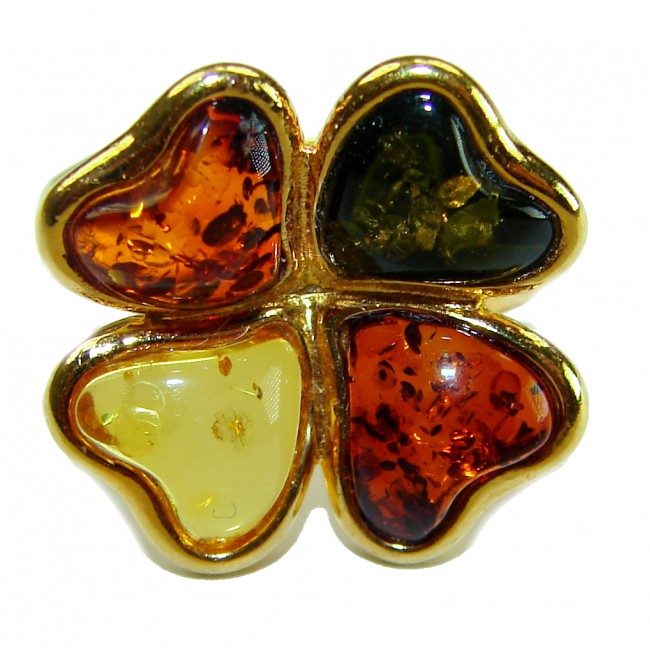 Beauty of the Nature Baltic Amber .925 Sterling Silver handcrafted HUGE ring; s. 7 adjustable - Clover-shaped pendant with Baltic amber stones, close-up view.