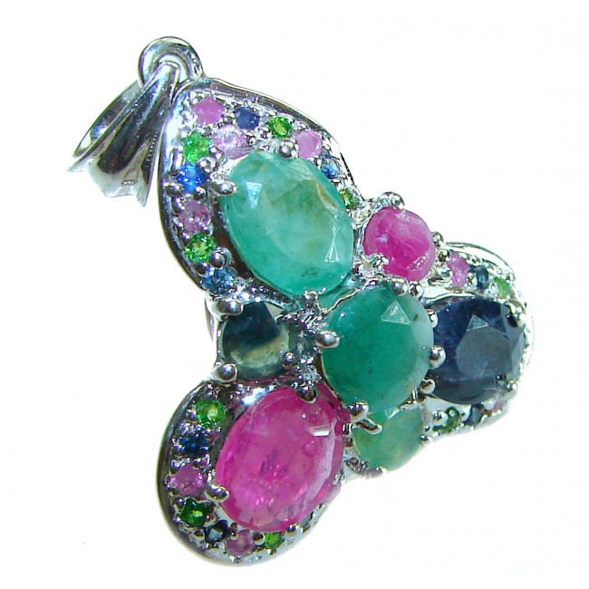 Authentic 12.5 carat Emerald Sapphire .925 Sterling Silver handcrafted Pendant - Close-up of multi-gemstone pendant with emerald and sapphire stones.