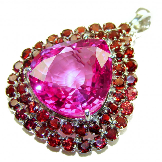 Penelope - 19.5 carat Pink Sapphire .925 Sterling Silver handmade Pendant Brooch - Close-up of Penelope pink sapphire pendant with red gems in silver setting