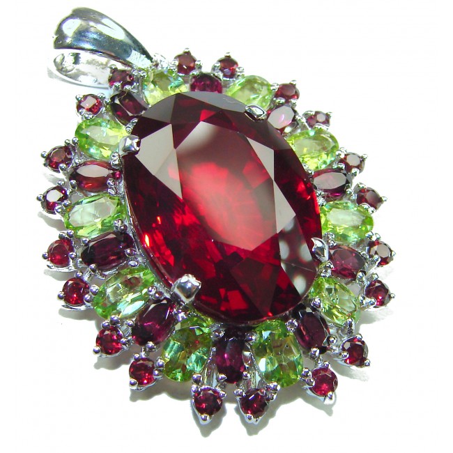 Victorian style 28.5 carat Authentic Ruby .925 Sterling Silver handcrafted Pendant - Close-up of Victorian style ruby pendant with gemstone accents