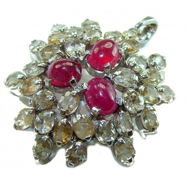 Deluxe 29.2 carat Ruby yellow Sapphire .925 Sterling Silver handmade Pendant - Close-up of ruby and sapphire pendant with sterling silver setting