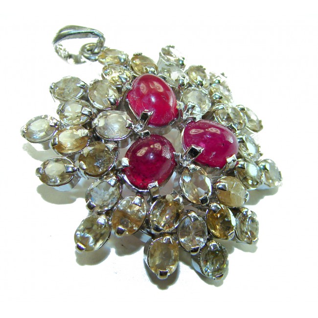 Deluxe 29.2 carat Ruby yellow Sapphire .925 Sterling Silver handmade Pendant - Pendant with rubies and sapphires, top view, in sterling silver setting.