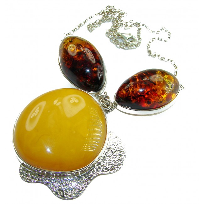 Rare Creation - natural Baltic Amber .925 Sterling Silver handcrafted necklace - Close-up of rare natural Baltic amber necklace with sterling silver.