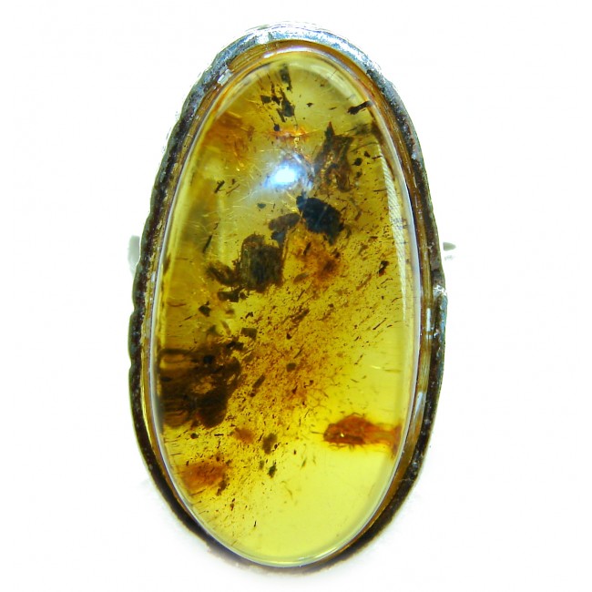 Beauty of the Nature Baltic Amber .925 Sterling Silver handcrafted HUGE ring; s. 7 adjustable - Close-up of Baltic amber in oval setting, silver mount visible.