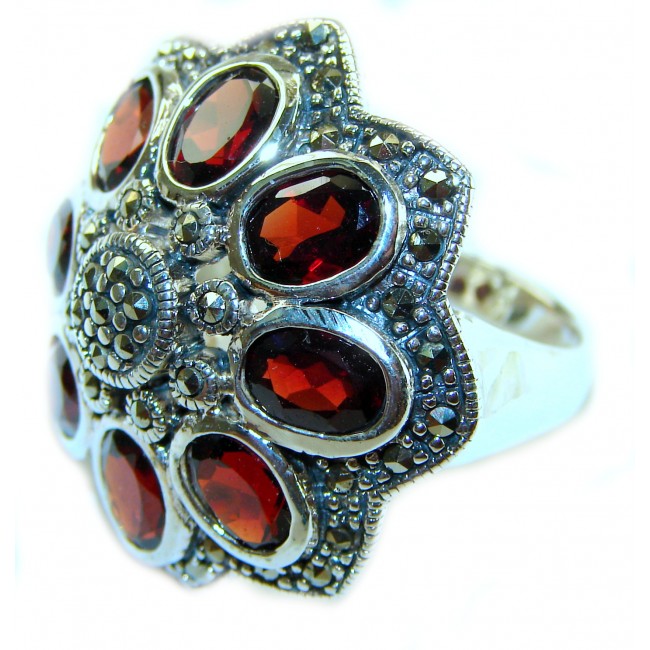 Royalty 22.5 carat oval cut Red Garnet .925 Sterling Silver handcrafted ring; s. 8