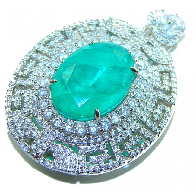 Luxurious 18.5 carat Emerald White Sapphire .925 Sterling Silver handcrafted pendant - Close-up of emerald and sapphire pendant on sterling silver.